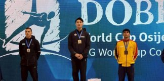 Tajvanski telovadec Tang osvojil zlato na bradlji na svetovnem pokalu v Osijeku Tajvanski telovadec Tang Chia-hung (v sredini) pozira z zlato medaljo na stopničkah ob srebrnem in bronastem medalistu v nedeljo na Hrvaškem. Foto: Huang Bo-rui